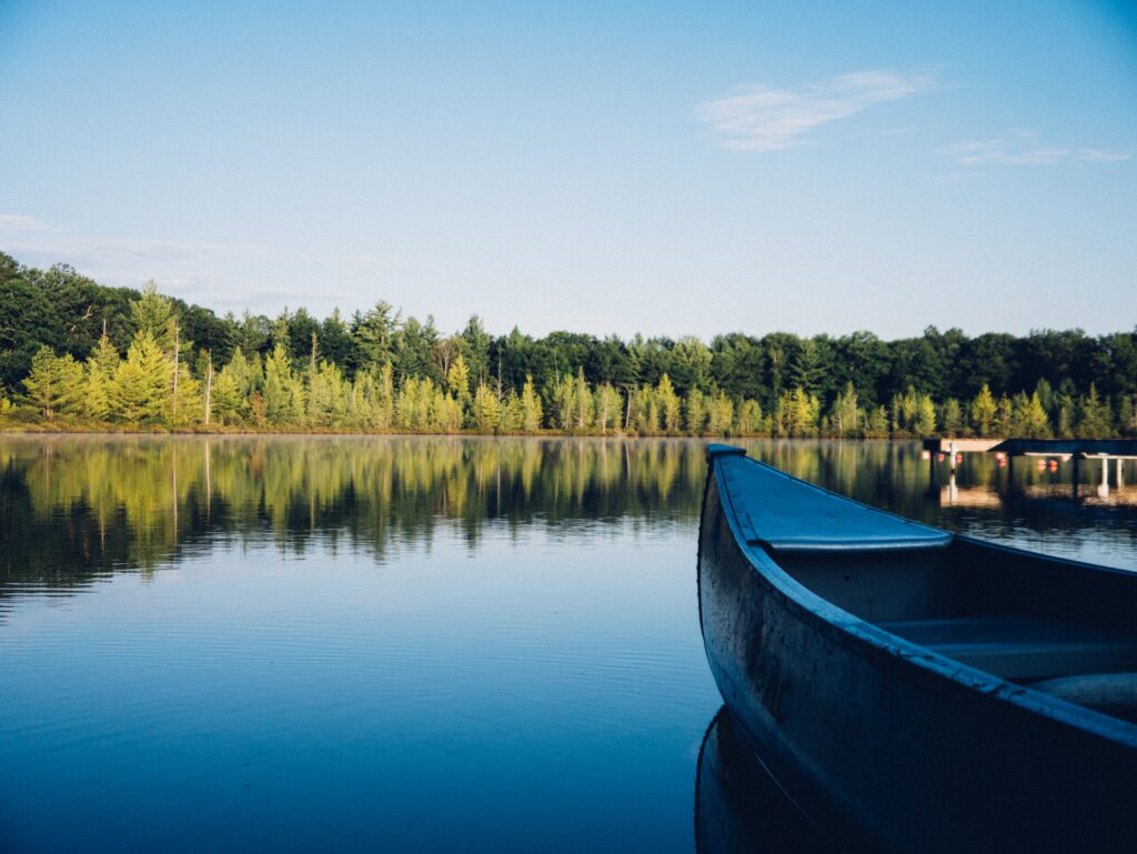 canoe on calm pond
