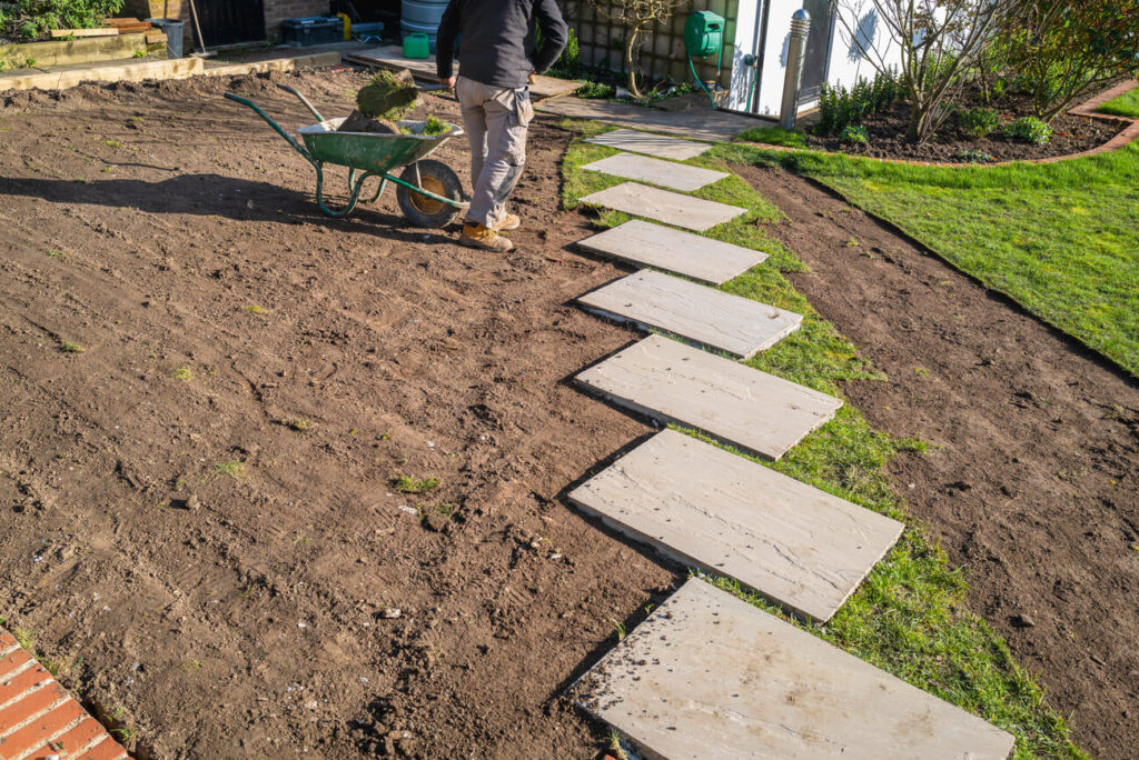 man working on lawn