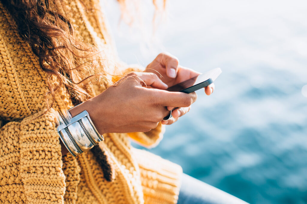 A woman looking at her phone