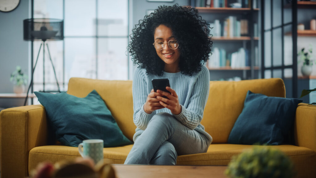 A woman looking at her phone